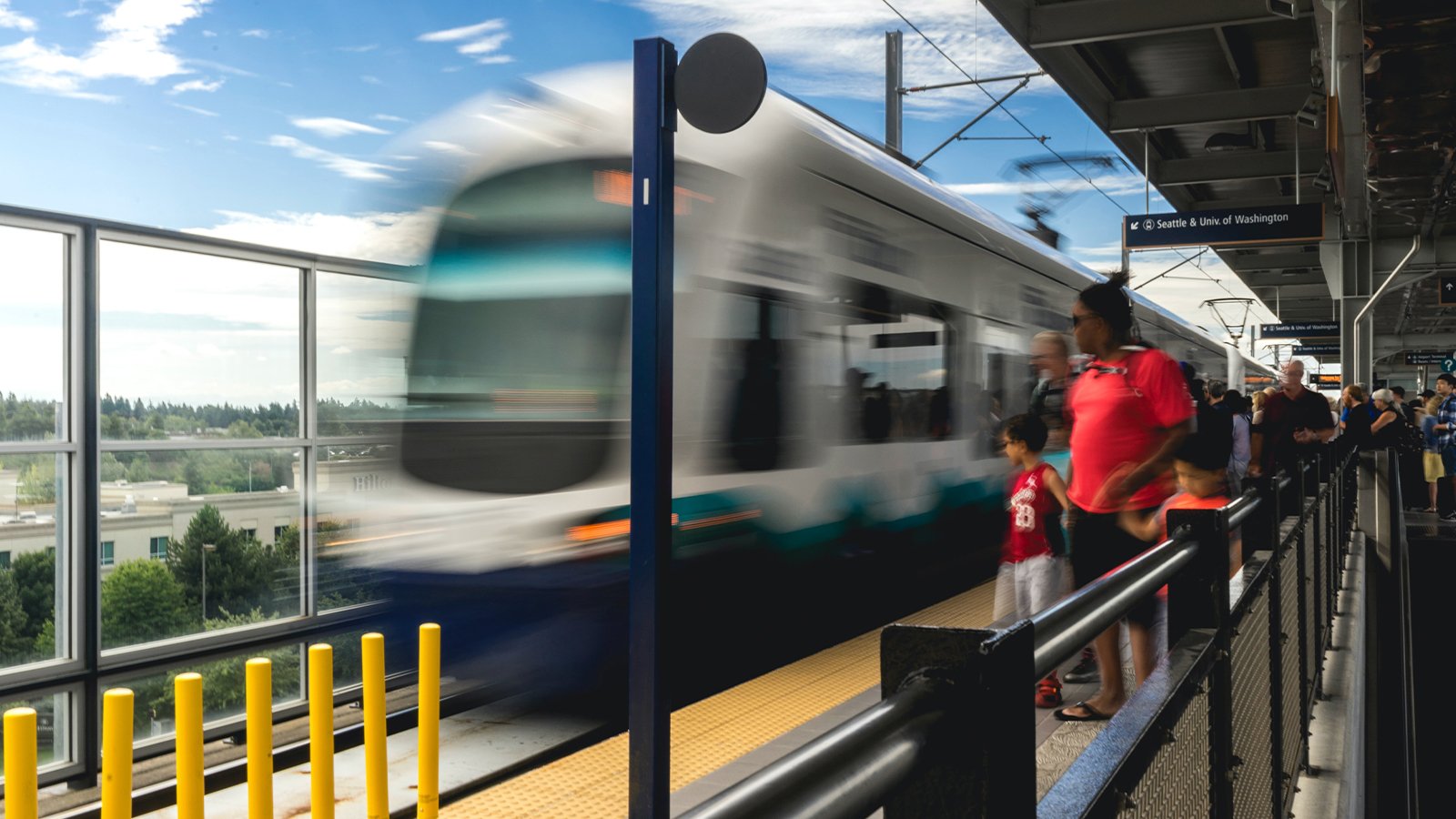 A train coming to a stop on a platform in Seattle.