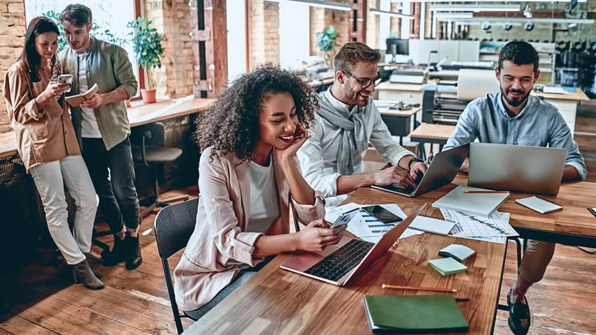 Young business people in coworking office