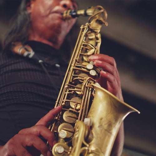 Jazz musician holding saxophone