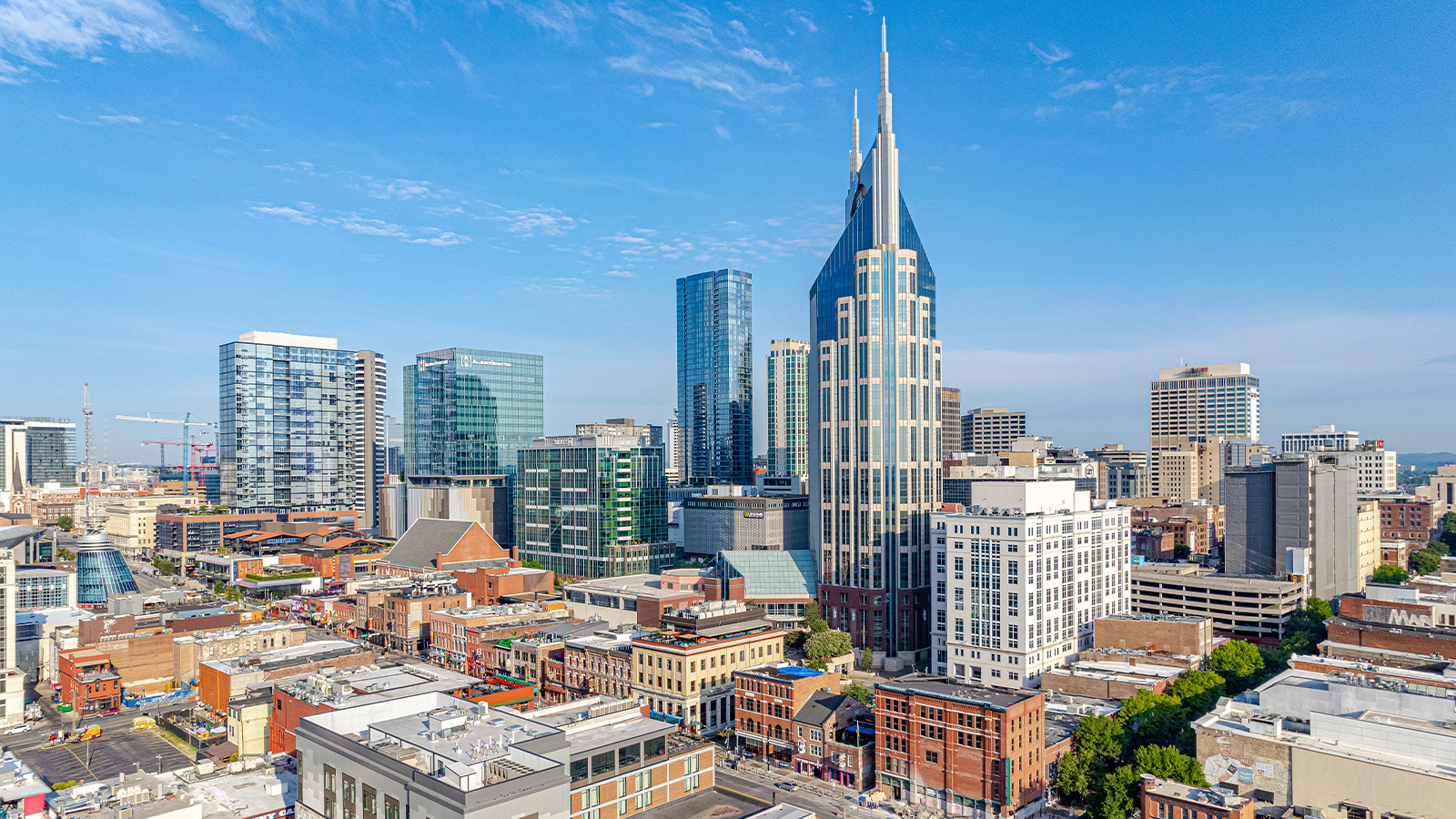 Nashville skyline under blue skies.